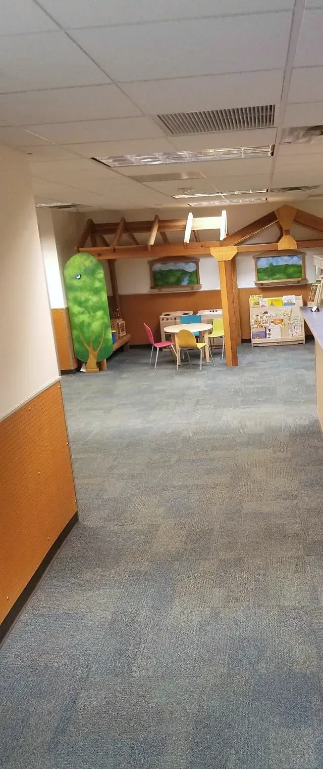 Clinic waiting room with a children's play corner