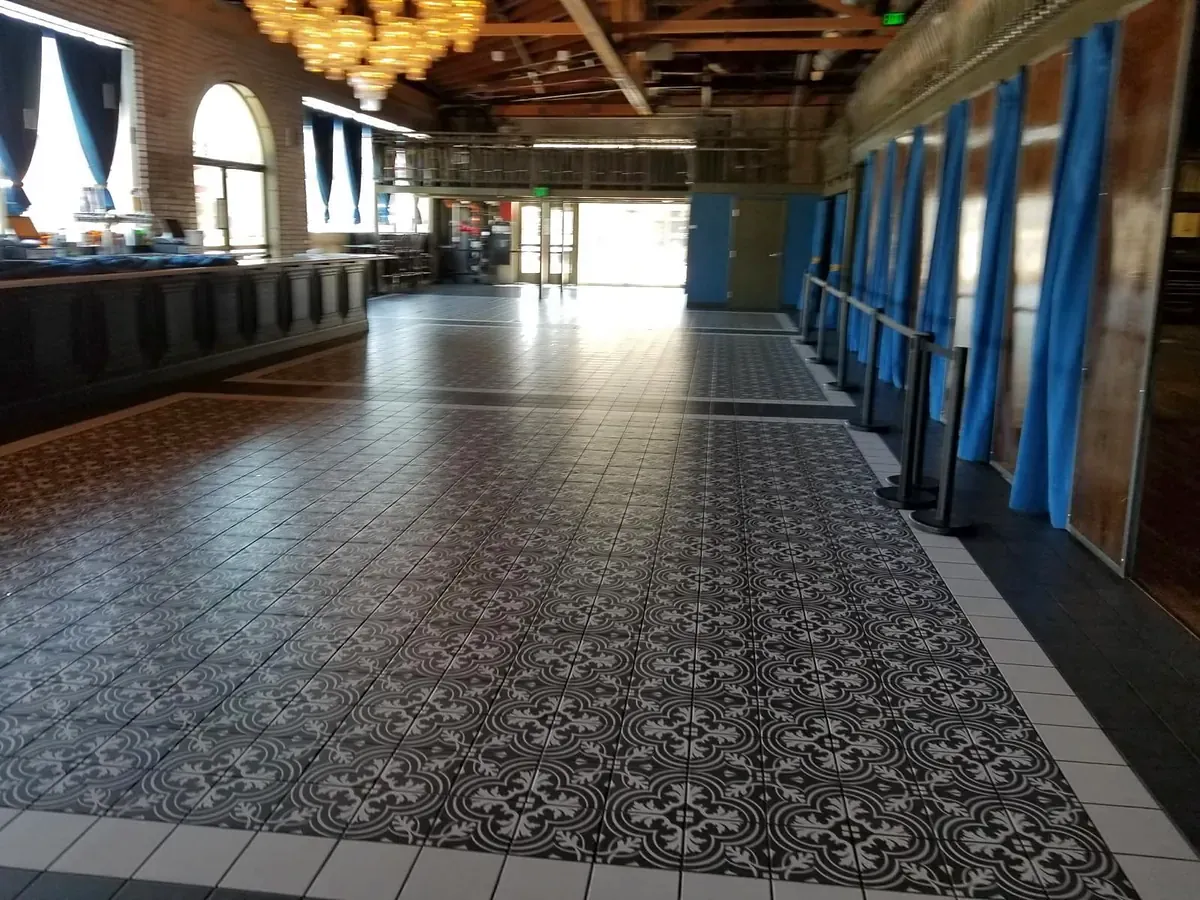 Lobby with a patterned tile floor